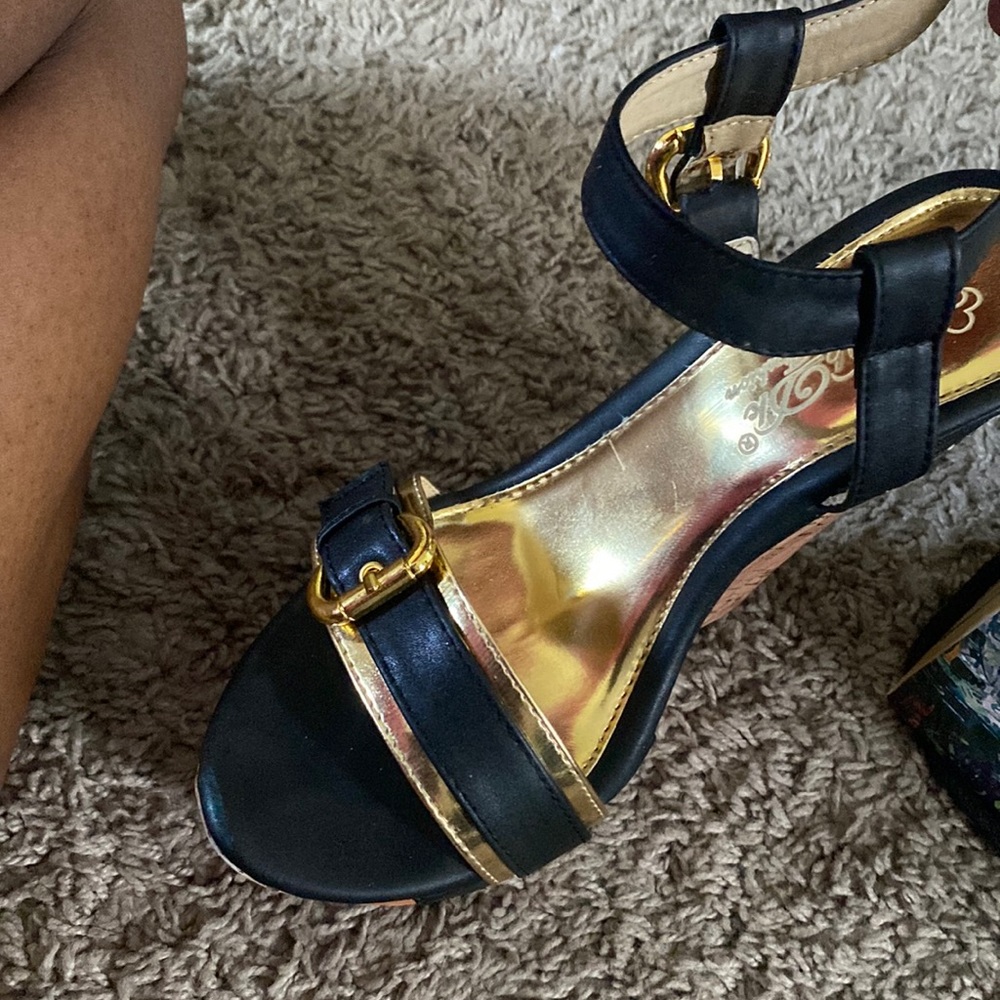 black and gold high heel shoes